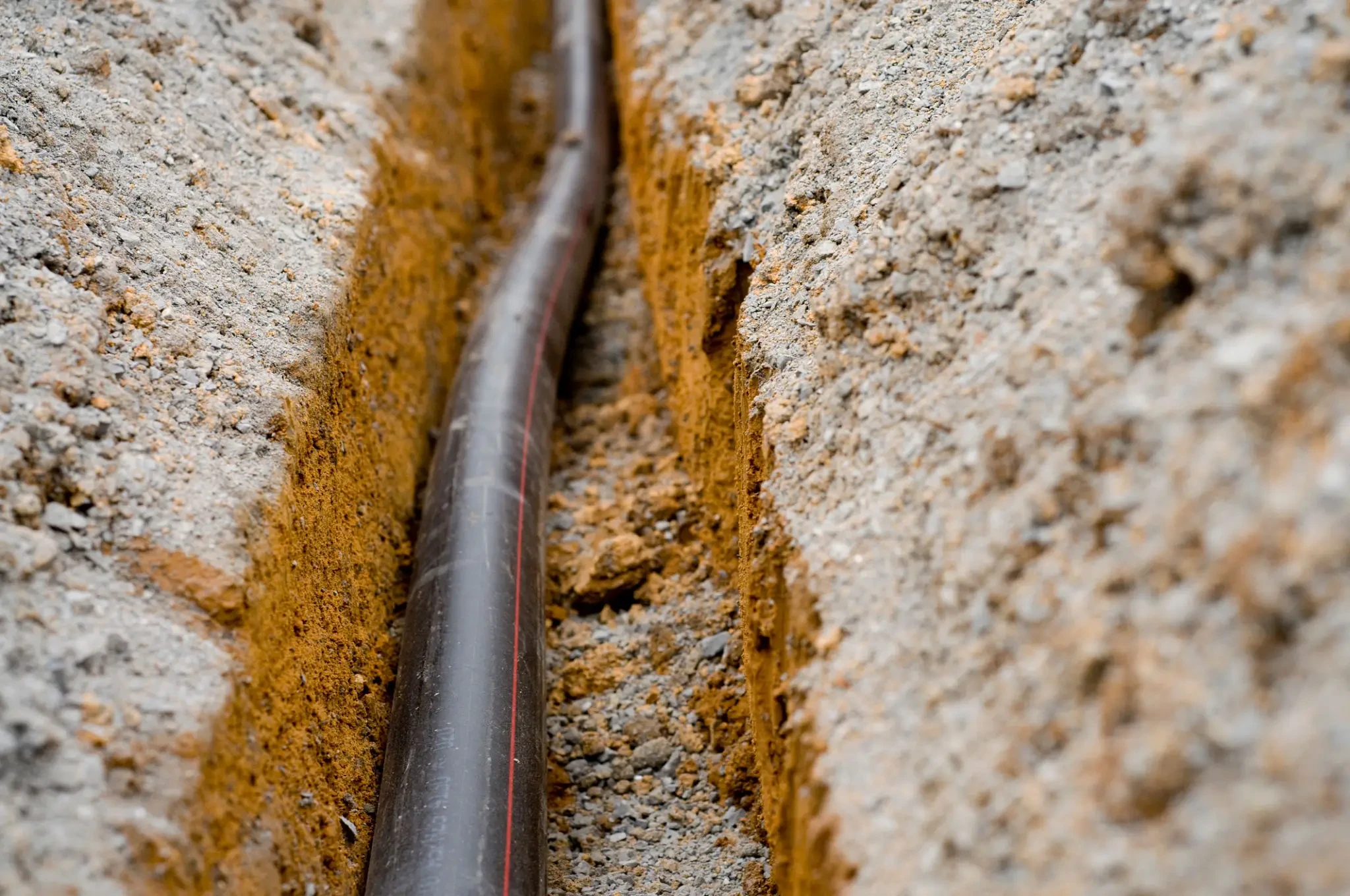 Underground utility installation on an active Camcor Site project